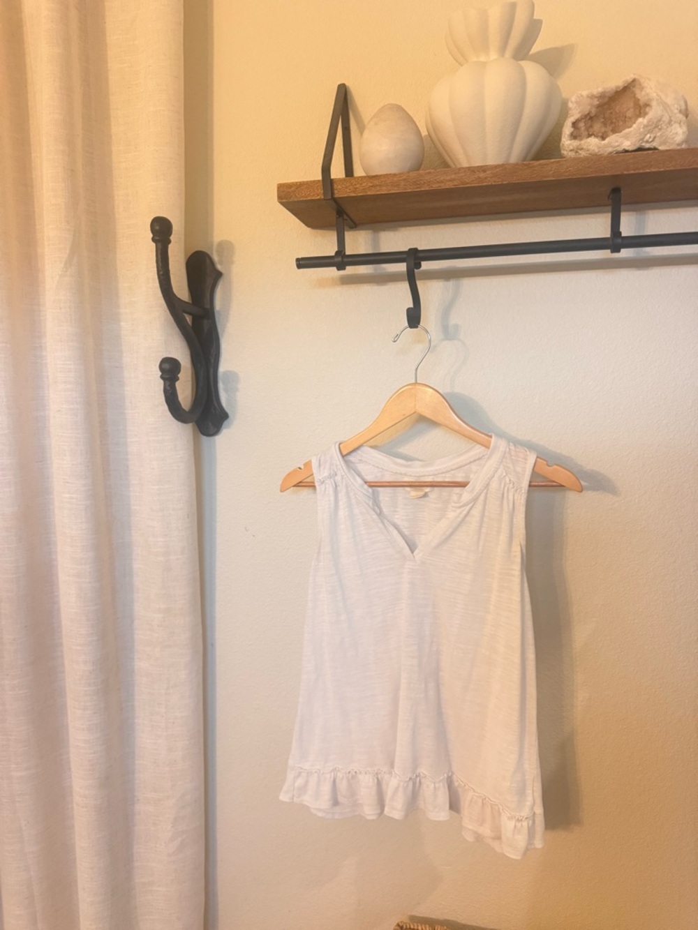 Maeve White Sleeveless Top with Ruffle Hem and Tulip Back